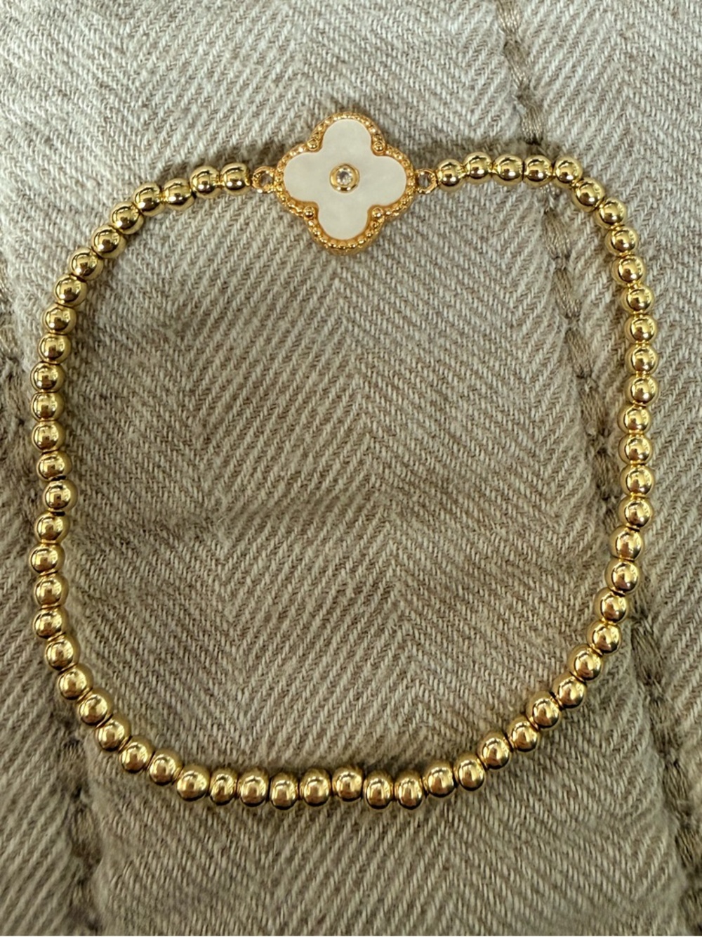 Gold Beaded Bracelet with White Clover Charm